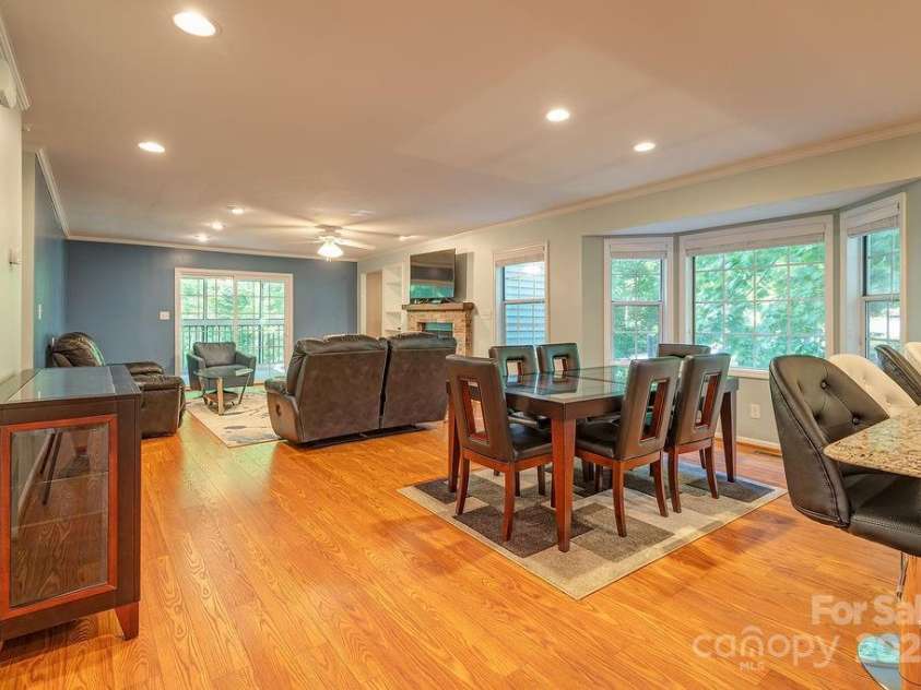 100 Thistle Knoll Court, Asheville, NC 28803.  MLS# CAR4278085, YatesRealty ID 27367. Tons of light, new flooring, great space for guests