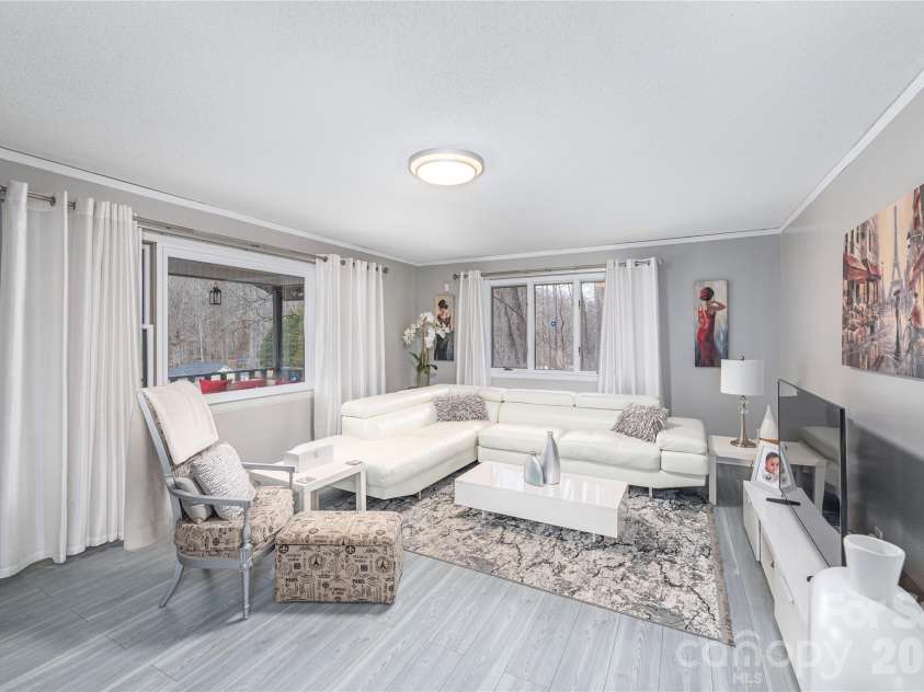 3415 Conleys Creek Road, Whittier, NC 28789.  MLS# CAR4336563, YatesRealty ID 2737. Living room 2