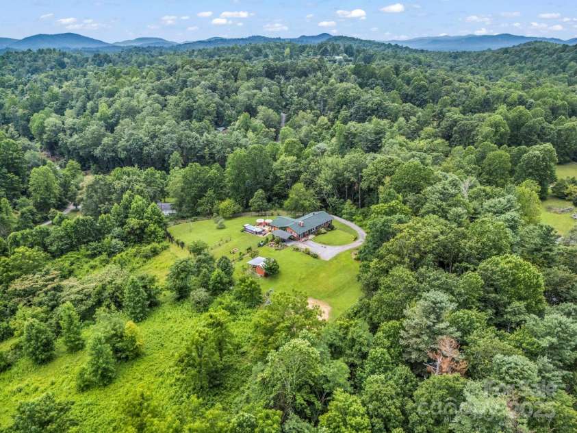 61 Overbrook Drive, Saluda, NC 28773.  MLS# CAR4281023, YatesRealty ID 27373. Nestled on your 