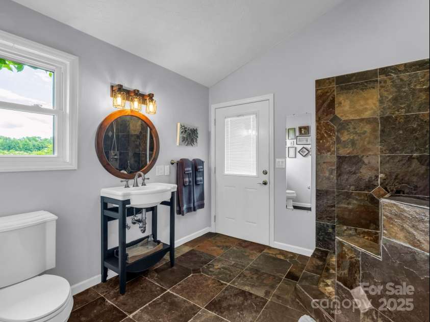 61 Overbrook Drive, Saluda, NC 28773.  MLS# CAR4281023, YatesRealty ID 27373. Primary Bath