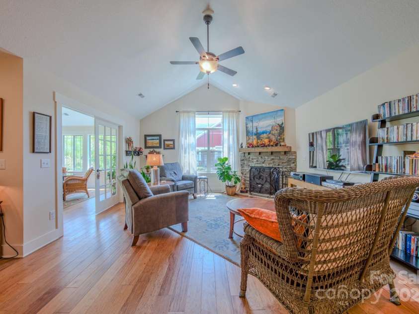 38 Westfield Way, Candler, NC 28715.  MLS# CAR4274179, YatesRealty ID 27377. Living area with cozy natural gas fireplace