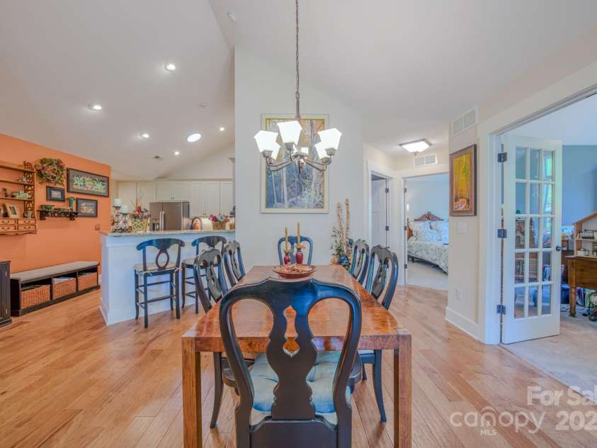 38 Westfield Way, Candler, NC 28715.  MLS# CAR4274179, YatesRealty ID 27377. Open living space into office and sunroom