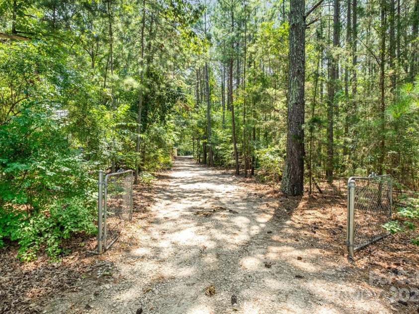 7362 Henry Harris Road, Lancaster, SC 29720.  MLS# CAR4278143, YatesRealty ID 27383. A beautiful 2 parcel property consisting of 2.56 acres