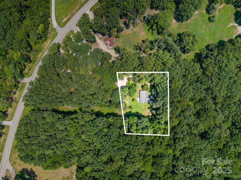7362 Henry Harris Road, Lancaster, SC 29720.  MLS# CAR4278143, YatesRealty ID 27383. This is the 1 acre parcel the house sits on, but it includes the 1.56 parcel in front
