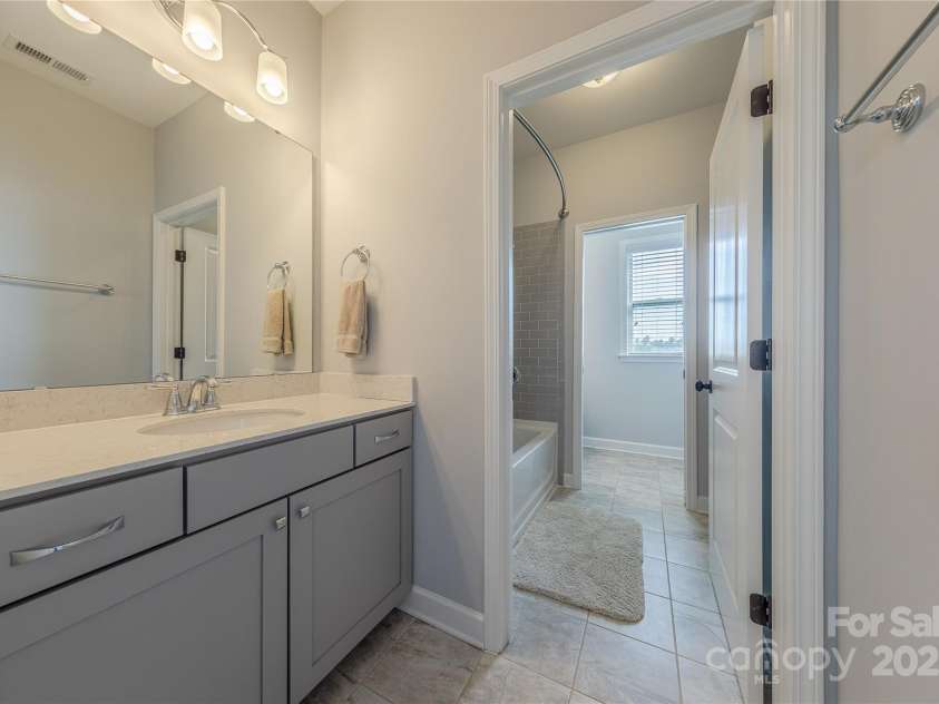 5266 Meadowcroft Way, Fort Mill, SC 29708.  MLS# CAR4278717, YatesRealty ID 27385. Jack N Jill Bath with Private Vanity Area