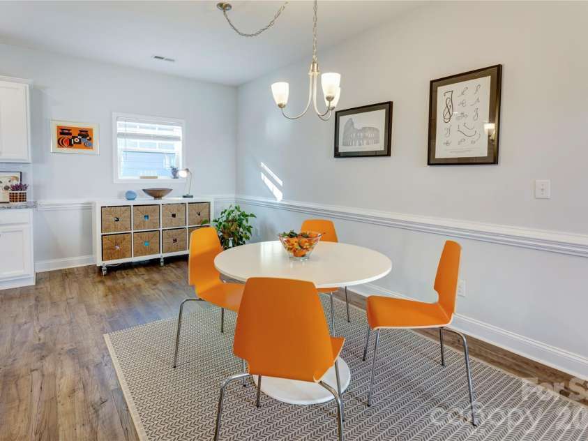 3577 County Down Avenue, Kannapolis, NC 28081.  MLS# CAR4372027, YatesRealty ID 27386. This large dining area could easily fit a larger table for 8