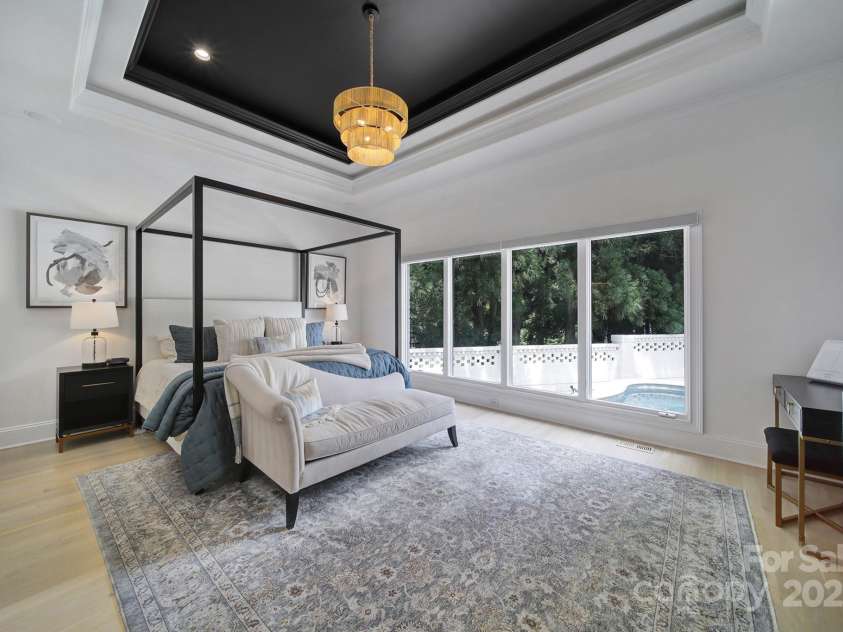 8016 Pemswood Street, Charlotte, NC 28277.  MLS# CAR4271864, YatesRealty ID 27389. Primary Bedroom with View of Pool...