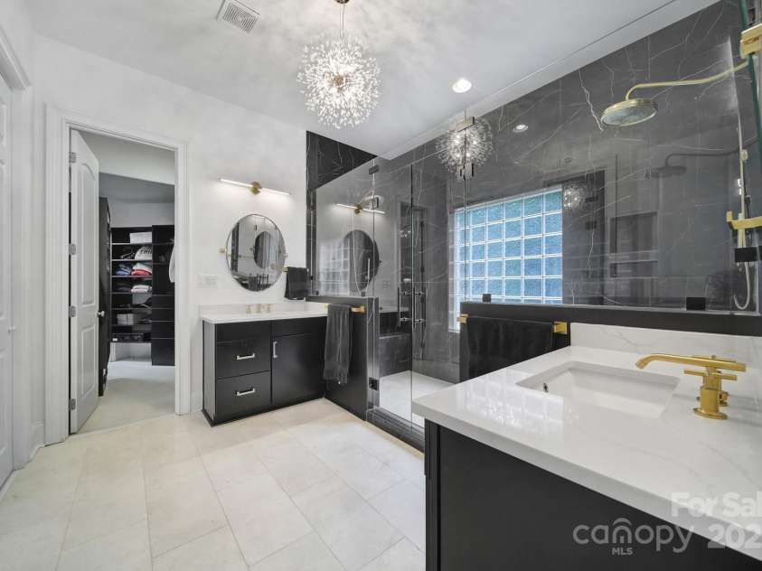 8016 Pemswood Street, Charlotte, NC 28277.  MLS# CAR4271864, YatesRealty ID 27389. Primary Ensuite Bath with Expanded Shower...