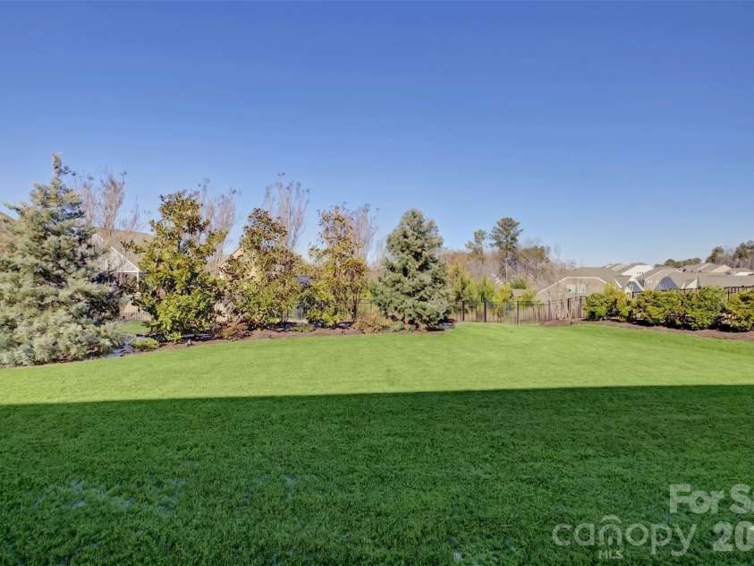 16541 Cozy Cove Road, Charlotte, NC 28278.  MLS# CAR4338314, YatesRealty ID 2739. Large flat yard with room for a pool