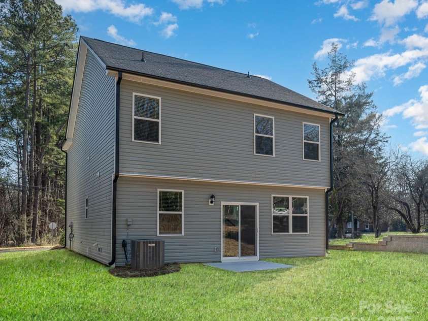 3008 Sadler Woods Lane, Charlotte, NC 28214.  MLS# CAR4210366, YatesRealty ID 2739. Back View. Representative Photo