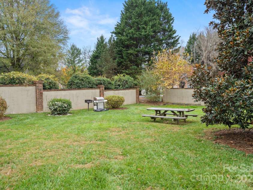 27 Capri Lane, Hendersonville, NC 28791.  MLS# CAR4200662, YatesRealty ID 274. Back Yard