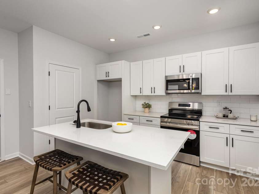 3016 Sadler Woods Lane, Charlotte, NC 28214.  MLS# CAR4210365, YatesRealty ID 2740. Kitchen. Representative Photo