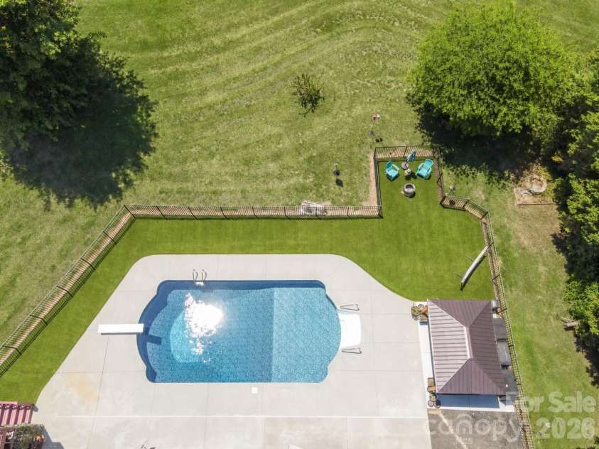 137 Natures Trail, Statesville, NC 28625.  MLS# CAR4382561, YatesRealty ID 27404. Expansive Private Backyard