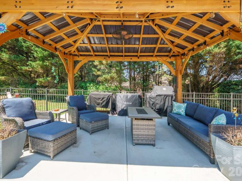 137 Natures Trail, Statesville, NC 28625.  MLS# CAR4382561, YatesRealty ID 27404. Poolside gazebo