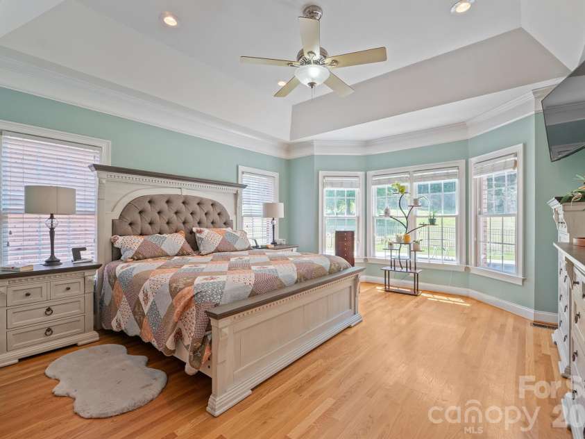 137 Natures Trail, Statesville, NC 28625.  MLS# CAR4382561, YatesRealty ID 27404. Primary Suite with tray ceiling