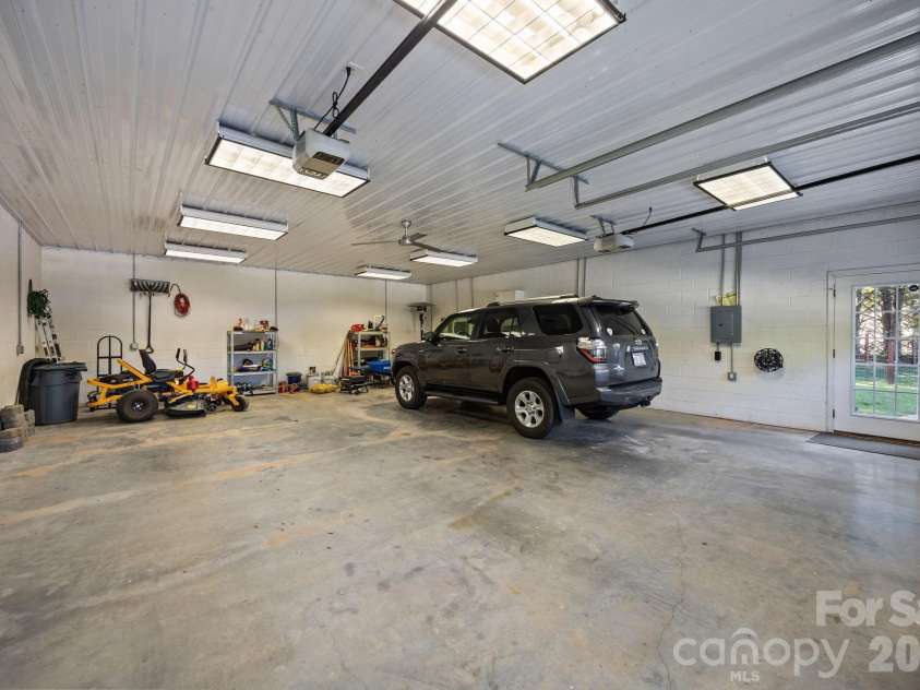3030 Lydia Lane, Newton, NC 28658.  MLS# CAR4373237, YatesRealty ID 27409. 4-car detached garage.