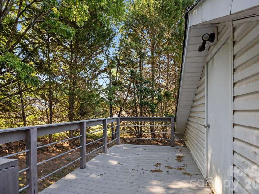 3030 Lydia Lane, Newton, NC 28658.  MLS# CAR4373237, YatesRealty ID 27409. Deck/access to unfinished bonus/storage area above detached garage.