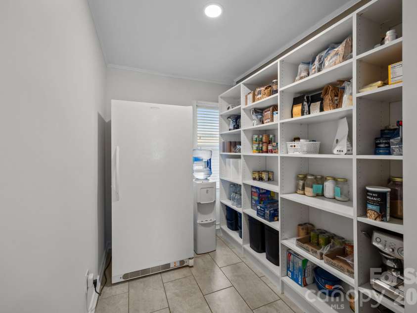 3030 Lydia Lane, Newton, NC 28658.  MLS# CAR4373237, YatesRealty ID 27409. Pantry and full-size freezer (conveys) between kitchen and garage.