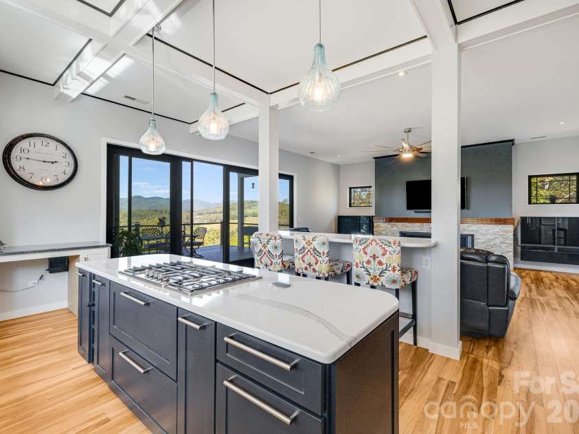 1387 Woods Ammons Road, Mars Hill, NC 28754.  MLS# CAR4303363, YatesRealty ID 2741. Kitchen and Family room