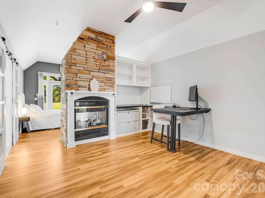 1387 Woods Ammons Road, Mars Hill, NC 28754.  MLS# CAR4303363, YatesRealty ID 2741. Primary Office with dual sided gas fireplace