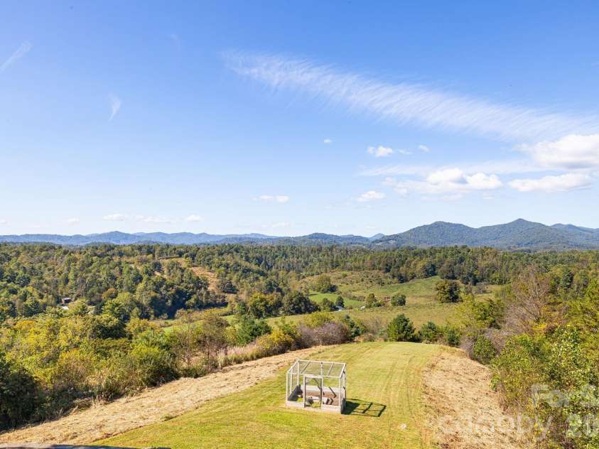 1387 Woods Ammons Road, Mars Hill, NC 28754.  MLS# CAR4303363, YatesRealty ID 2741. Small pasture off the back of the home - lots of possibilities