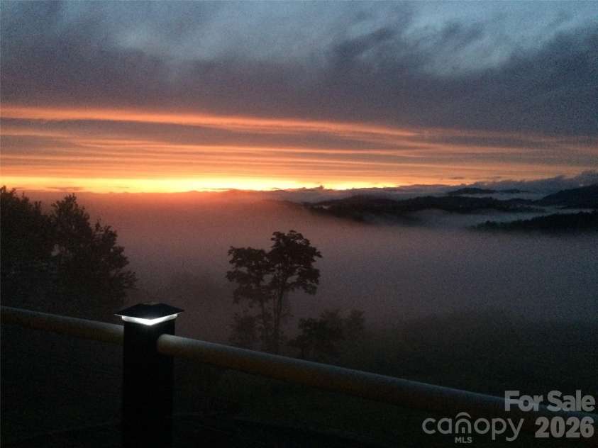 1387 Woods Ammons Road, Mars Hill, NC 28754.  MLS# CAR4303363, YatesRealty ID 2741. Sunset - Clouds in the Valley -Seller Provided