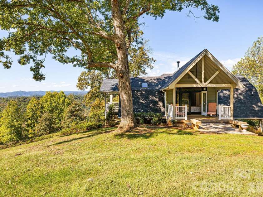 1387 Woods Ammons Road, Mars Hill, NC 28754.  MLS# CAR4303363, YatesRealty ID 2741. View from back fence line of primary deck