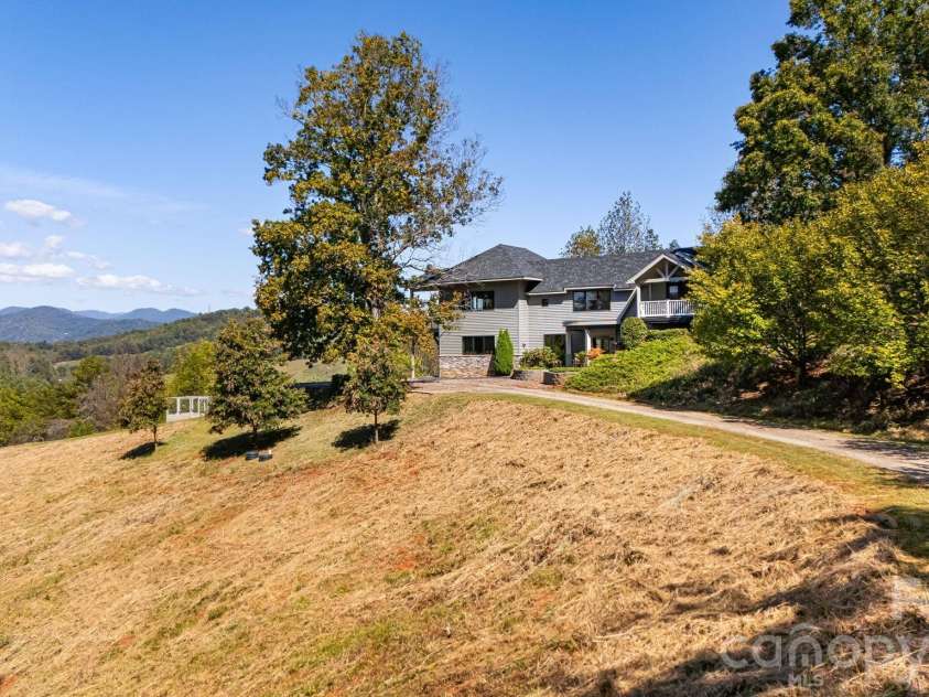 1387 Woods Ammons Road, Mars Hill, NC 28754.  MLS# CAR4303363, YatesRealty ID 2741. View from entry gate - Fall