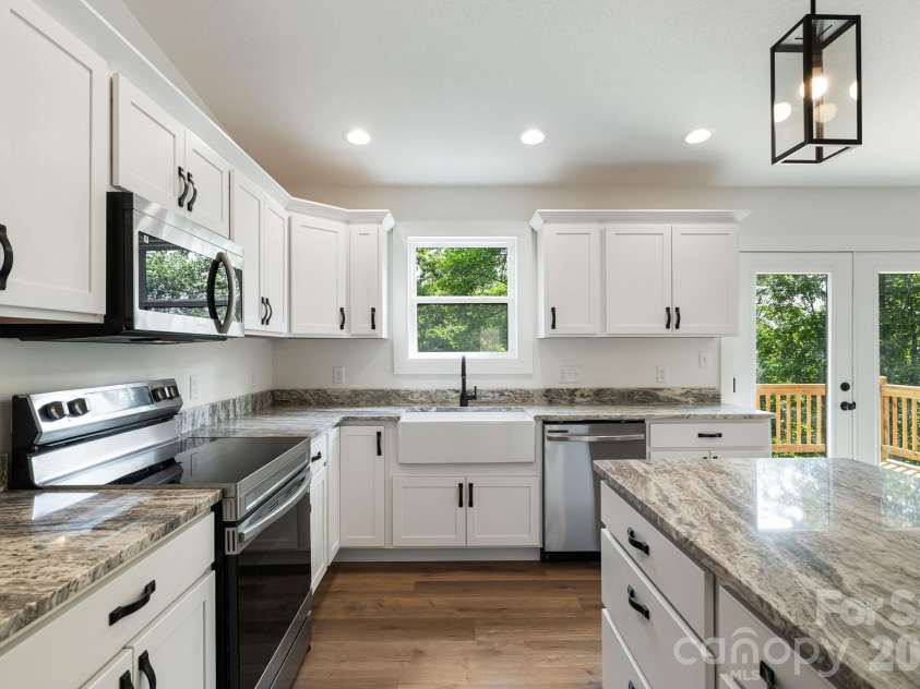 69 Quiet Woods Drive, Leicester, NC 28748.  MLS# CAR4381773, YatesRealty ID 27411. 
