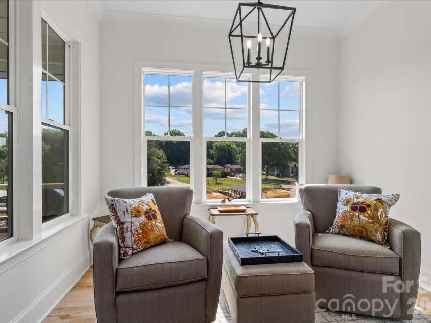 176 Hazelton Loop, Mooresville, NC 28117.  MLS# CAR4385381, YatesRealty ID 27414. Breakfast Nook faces water and East