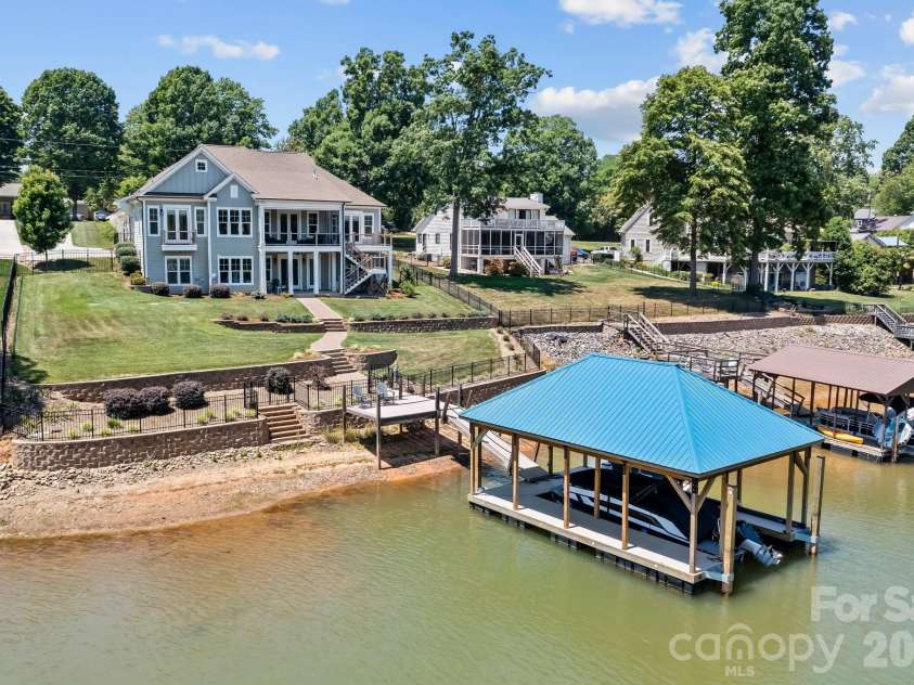 176 Hazelton Loop, Mooresville, NC 28117.  MLS# CAR4385381, YatesRealty ID 27414. Dredged waterfront and new dock
