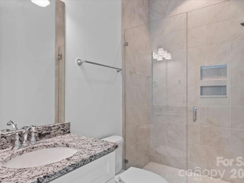 176 Hazelton Loop, Mooresville, NC 28117.  MLS# CAR4385381, YatesRealty ID 27414. En-suite bath for bedroom 2