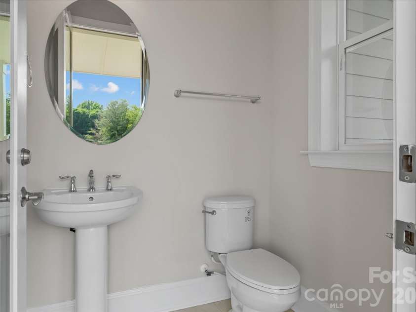 176 Hazelton Loop, Mooresville, NC 28117.  MLS# CAR4385381, YatesRealty ID 27414. Heated and cooled Half Bath is accessed from the exterior