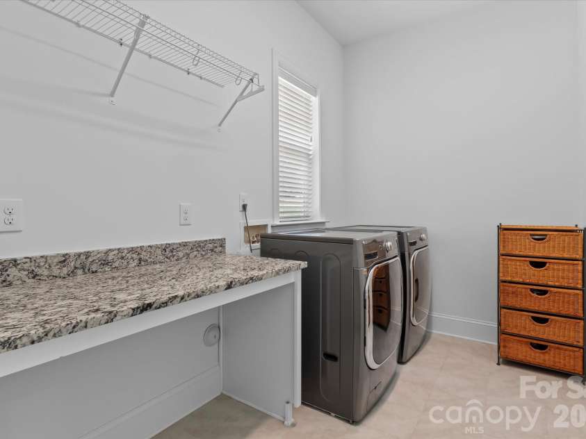 176 Hazelton Loop, Mooresville, NC 28117.  MLS# CAR4385381, YatesRealty ID 27414. Laundry area