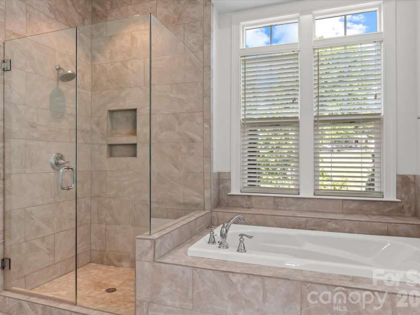 176 Hazelton Loop, Mooresville, NC 28117.  MLS# CAR4385381, YatesRealty ID 27414. Owner's Bath