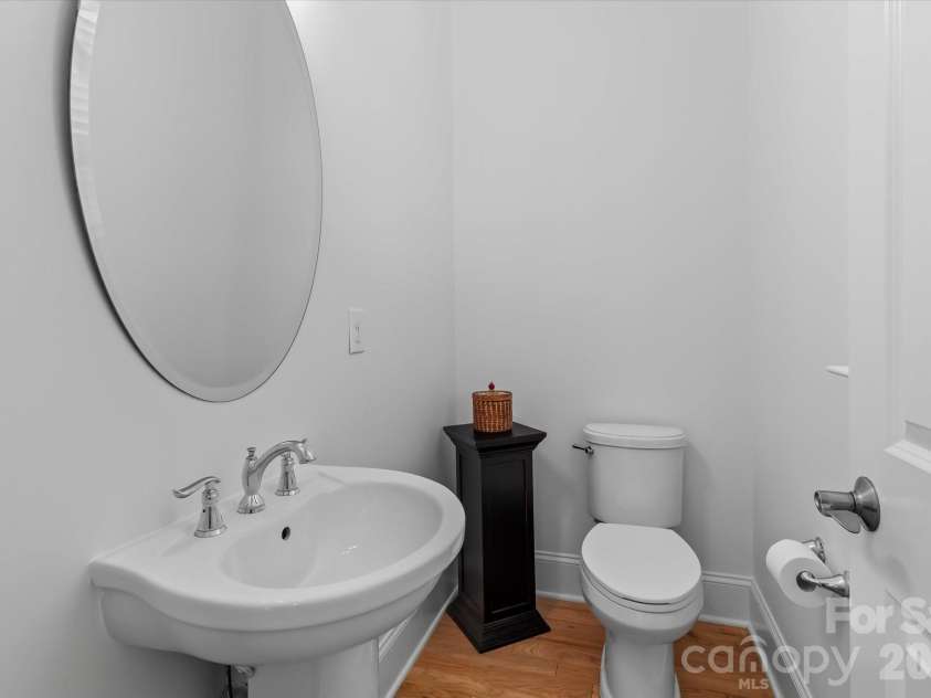 176 Hazelton Loop, Mooresville, NC 28117.  MLS# CAR4385381, YatesRealty ID 27414. Powder Room on main floor