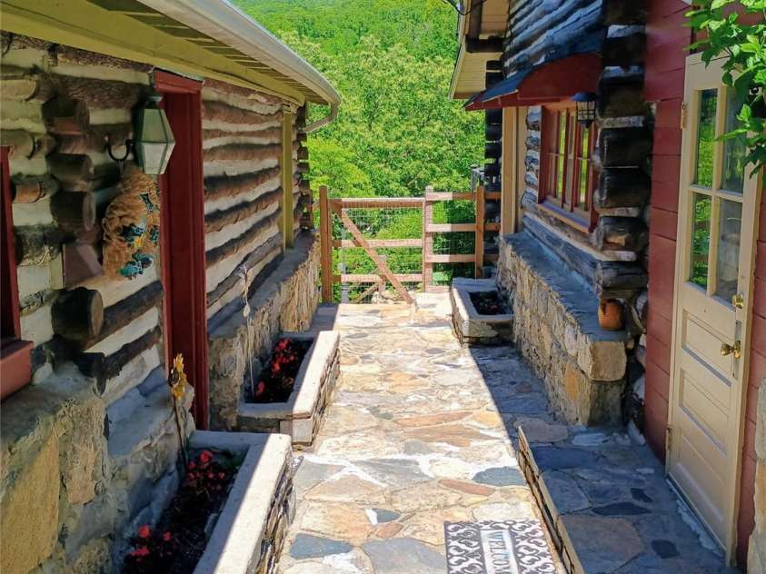 72 Chestnut Hill Road, Gerton, NC 28735.  MLS# CAR4375202, YatesRealty ID 27416. Breezeway between cabins
