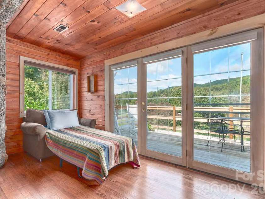 72 Chestnut Hill Road, Gerton, NC 28735.  MLS# CAR4375202, YatesRealty ID 27416. Main Cabin - flex space/sitting area