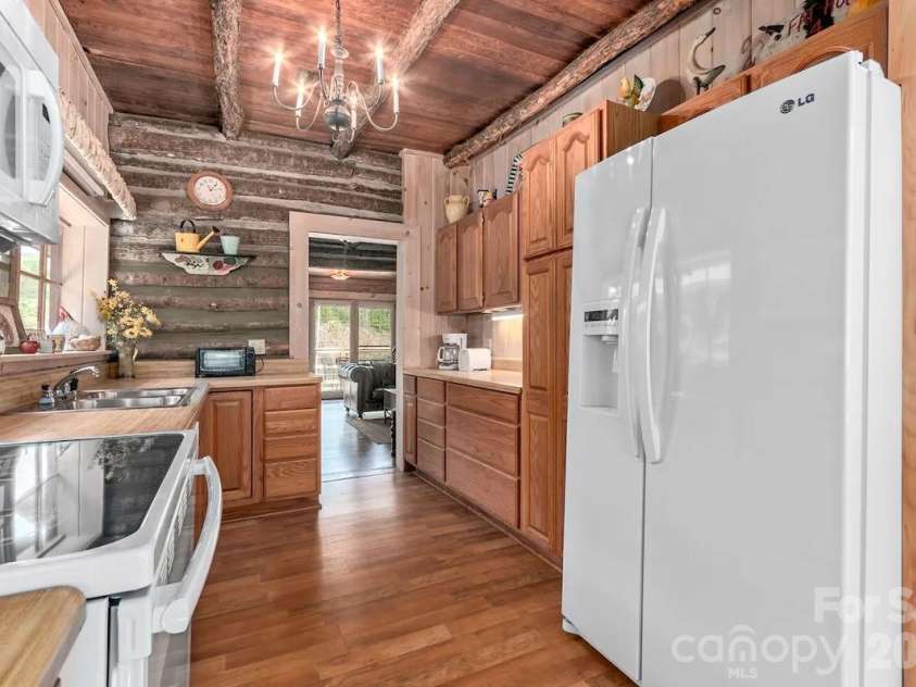 72 Chestnut Hill Road, Gerton, NC 28735.  MLS# CAR4375202, YatesRealty ID 27416. Main Cabin - kitchen