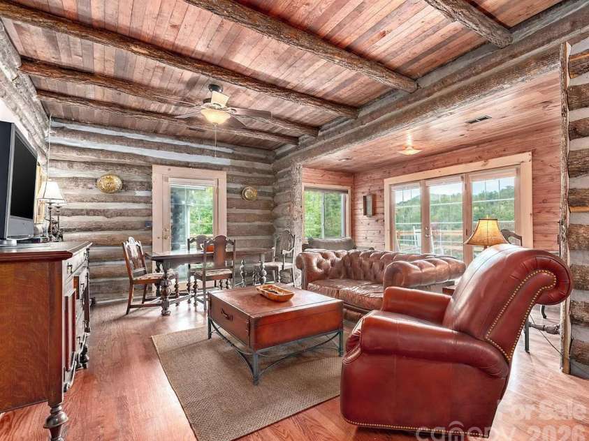 72 Chestnut Hill Road, Gerton, NC 28735.  MLS# CAR4375202, YatesRealty ID 27416. Main Cabin - living room
