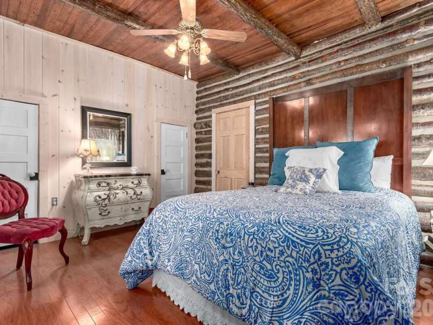 72 Chestnut Hill Road, Gerton, NC 28735.  MLS# CAR4375202, YatesRealty ID 27416. Main Cabin - primary bedroom