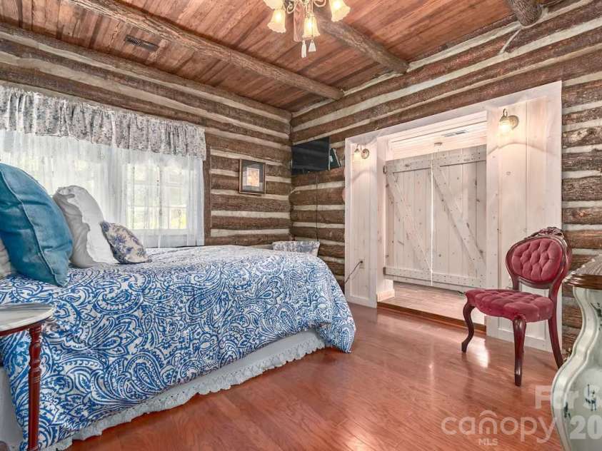72 Chestnut Hill Road, Gerton, NC 28735.  MLS# CAR4375202, YatesRealty ID 27416. Main Cabin - primary bedroom