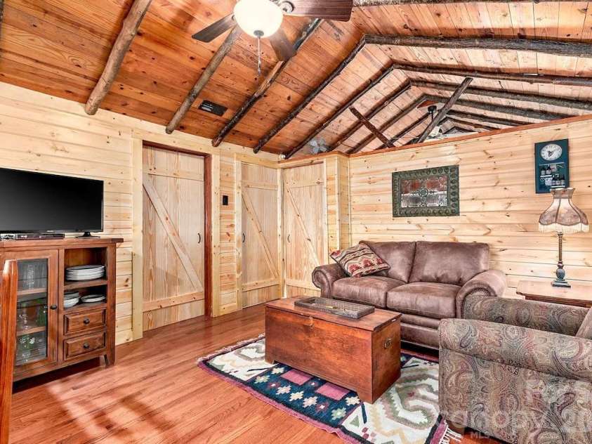 72 Chestnut Hill Road, Gerton, NC 28735.  MLS# CAR4375202, YatesRealty ID 27416. Sunflower Cottage - sitting area