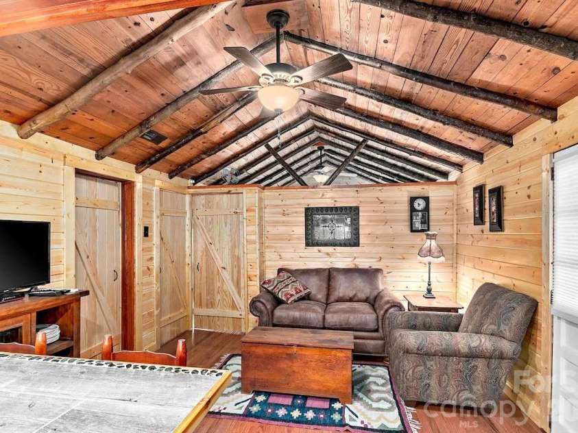 72 Chestnut Hill Road, Gerton, NC 28735.  MLS# CAR4375202, YatesRealty ID 27416. Sunflower Cottage - sitting area