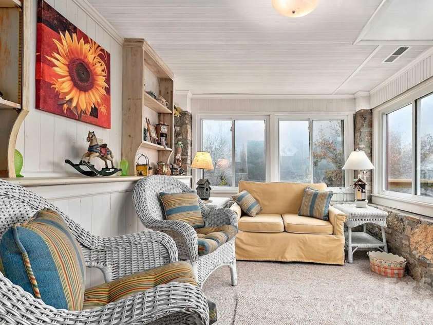 72 Chestnut Hill Road, Gerton, NC 28735.  MLS# CAR4375202, YatesRealty ID 27416. Sunflower Cottage - sunroom