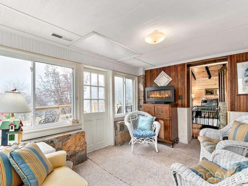 72 Chestnut Hill Road, Gerton, NC 28735.  MLS# CAR4375202, YatesRealty ID 27416. Sunflower Cottage - sunroom