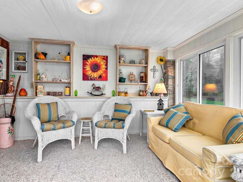 72 Chestnut Hill Road, Gerton, NC 28735.  MLS# CAR4375202, YatesRealty ID 27416. Sunflower Cottage - sunroom