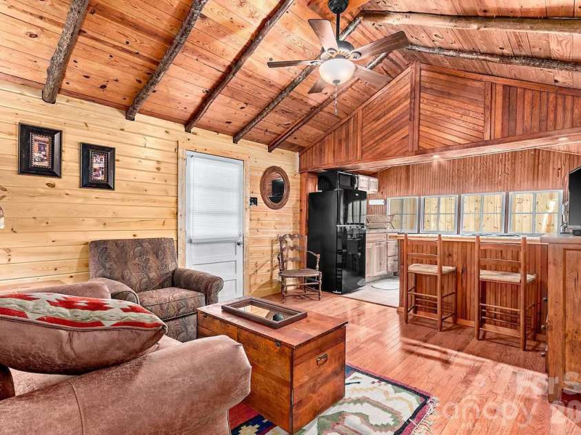 72 Chestnut Hill Road, Gerton, NC 28735.  MLS# CAR4375202, YatesRealty ID 27416. Sunflower Cottage - view toward kitchen