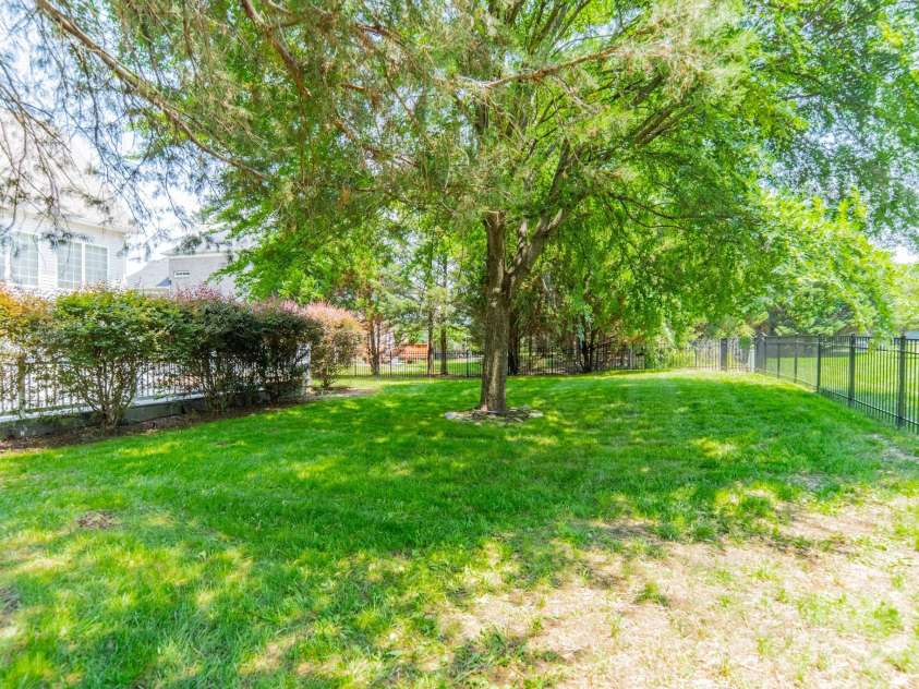 1109 Cooper Lane, Indian Trail, NC 28079.  MLS# CAR4384307, YatesRealty ID 27420. Back yard with private deck.