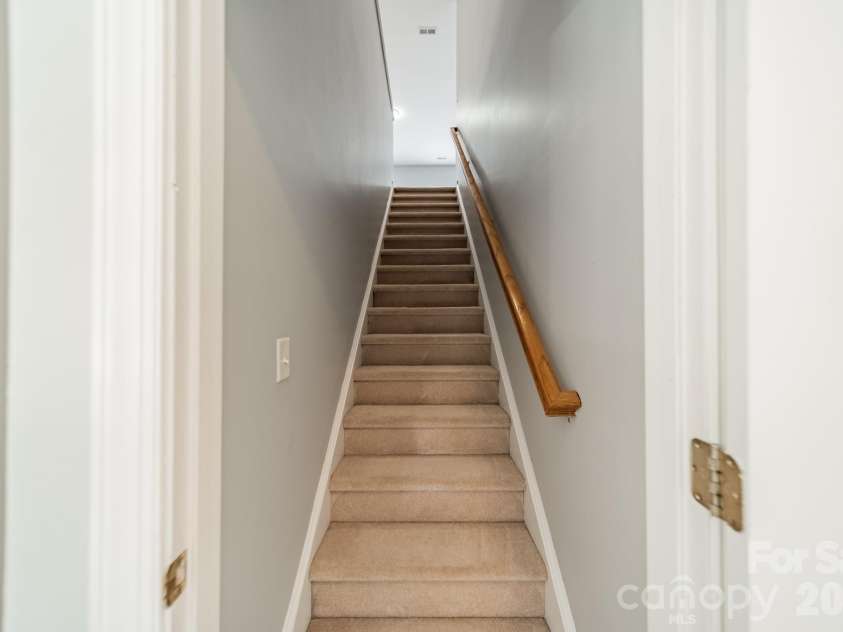 1109 Cooper Lane, Indian Trail, NC 28079.  MLS# CAR4384307, YatesRealty ID 27420. Stairs to Third Floor Bonus